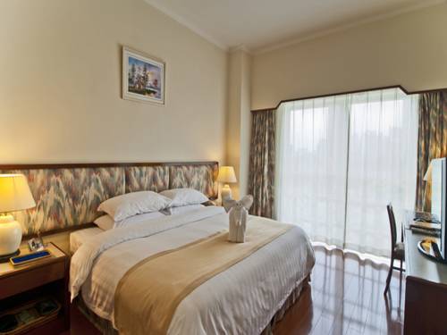Imagen de la habitación del Hotel Hna Business Downtown Haikou. Foto 6