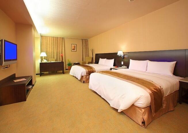 Imagen de la habitación del Hotel Ho Fong Business Stay. Foto 13