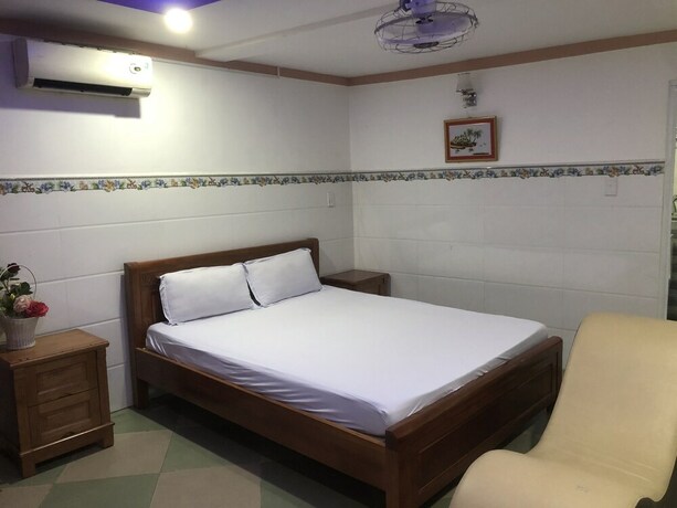Imagen de la habitación del Hotel Hoa Ban. Foto 19