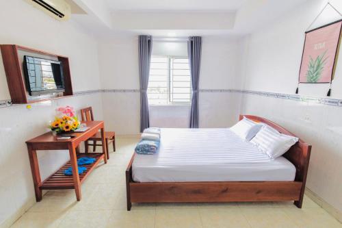 Imagen de la habitación del Hotel Hoa C&uacute;c Phương Dĩ An - B&igrave;nh Dương. Foto 15