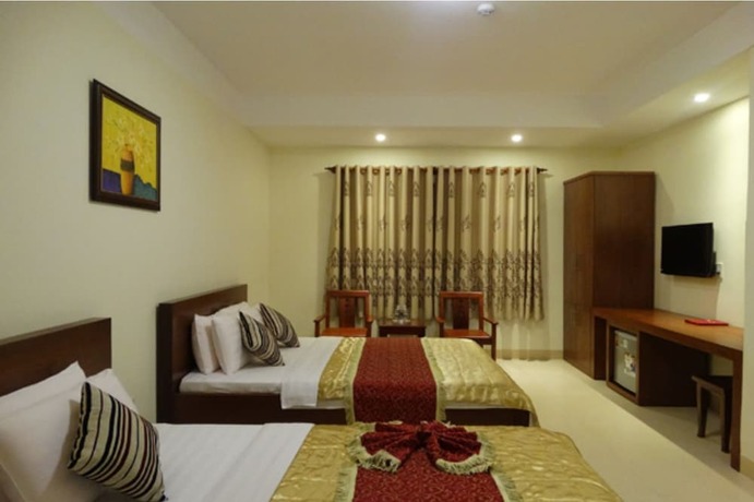 Imagen de la habitación del Hotel Hoa Vinh. Foto 21