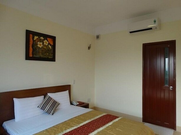 Imagen de la habitación del Hotel Hoa Vinh. Foto 23