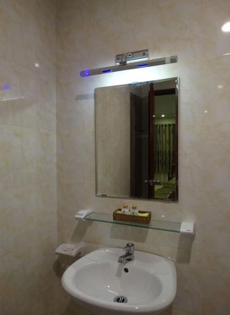 Imagen de la habitación del Hotel Hoa Vinh. Foto 25