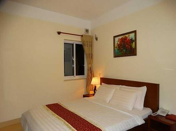 Imagen de la habitación del Hotel Hoa Vinh. Foto 30