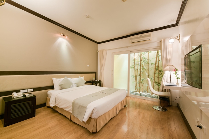 Imagen de la habitación del Hotel Hoabinh Palace. Foto 7