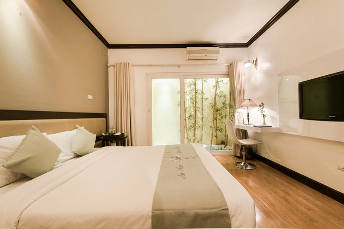 Imagen de la habitación del Hotel Hoabinh Palace. Foto 8