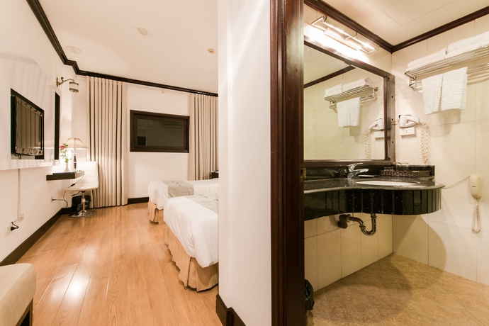 Imagen de la habitación del Hotel Hoabinh Palace. Foto 11
