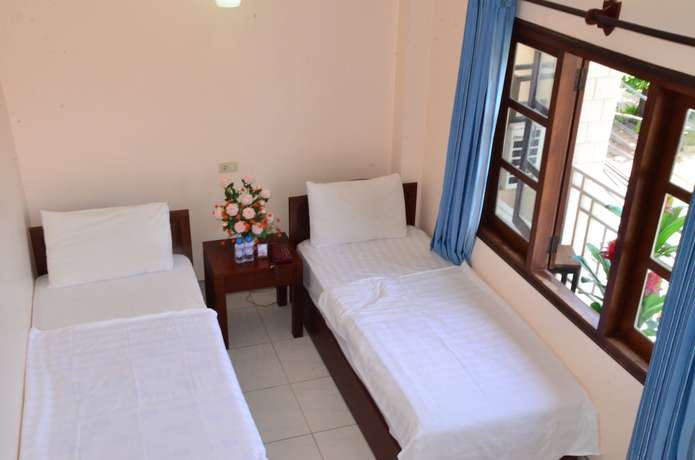 Imagen de la habitación del Hotel Hoang Kim. Foto 14