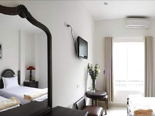 Imagen de la habitación del Hotel Hoang Le. Foto 6