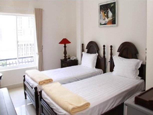 Imagen de la habitación del Hotel Hoang Le. Foto 10