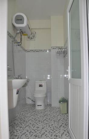 Imagen de la habitación del Hotel Hoang Nguyen. Foto 11