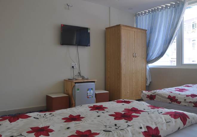 Imagen de la habitación del Hotel Hoang Nguyen. Foto 12