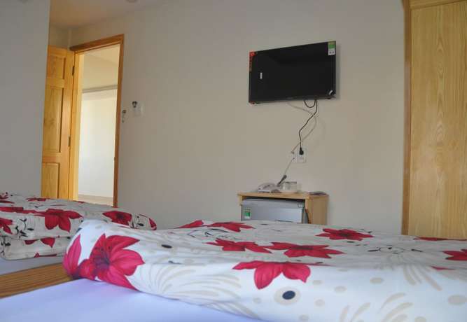 Imagen de la habitación del Hotel Hoang Nguyen. Foto 13