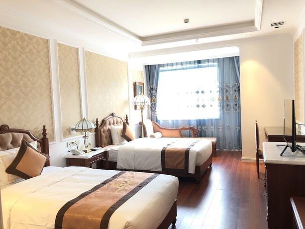 Imagen de la habitación del Hotel Hoang Nham Luxury. Foto 16