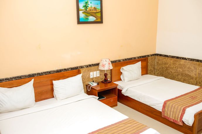 Imagen de la habitación del Hotel Hoang Van. Foto 12