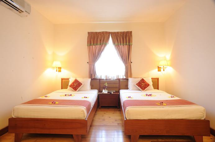 Imagen de la habitación del Hotel Hoang Yen, Thuận An. Foto 11