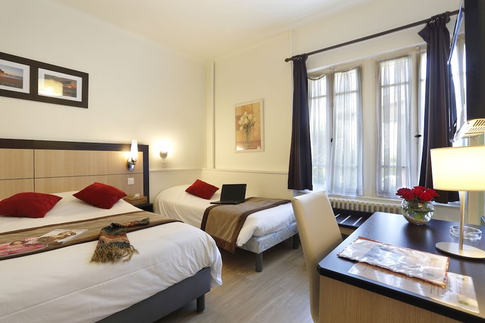 Imagen de la habitación del Hotel H&ocirc;tel A l\'Ombre des Marronniers. Foto 2