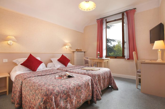 Imagen de la habitación del Hotel H&ocirc;tel A l\'Ombre des Marronniers. Foto 4