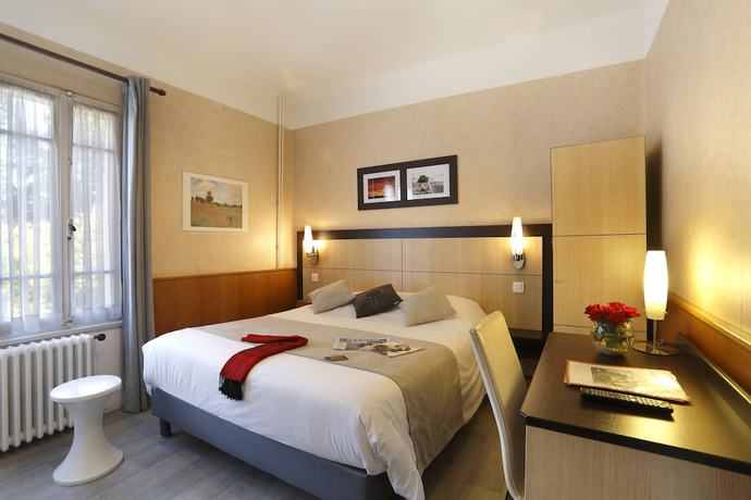 Imagen de la habitación del Hotel H&ocirc;tel A l\'Ombre des Marronniers. Foto 9