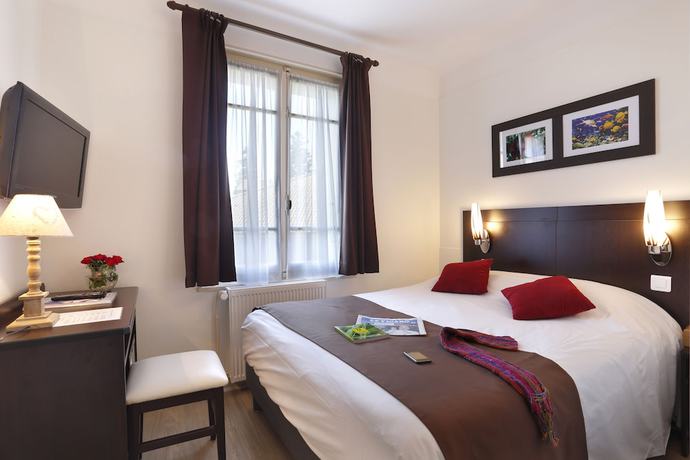 Imagen de la habitación del Hotel H&ocirc;tel A l\'Ombre des Marronniers. Foto 16