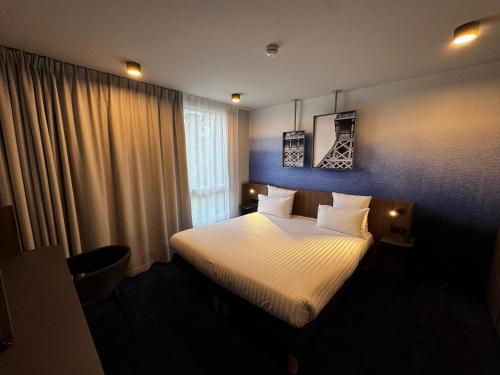 Imagen de la habitación del Hotel H&ocirc;tel AKENA Serris - Val d\'Europe. Foto 19