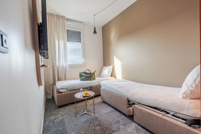 Imagen de la habitación del Hotel H&ocirc;tel Akena Ch&acirc;lons en Champagne. Foto 9