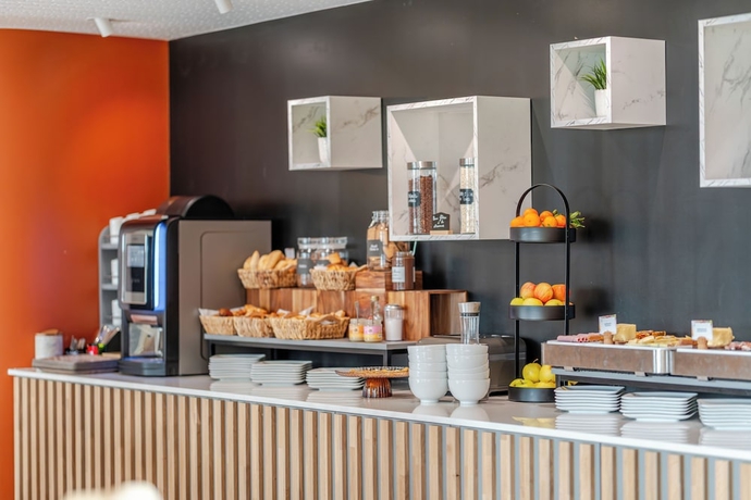 Imagen del bar/restaurante del Hotel H&ocirc;tel Akena Ch&acirc;lons en Champagne. Foto 2