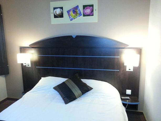 Imagen de la habitación del Hotel Hôtel Akena City Caudry. Foto 17