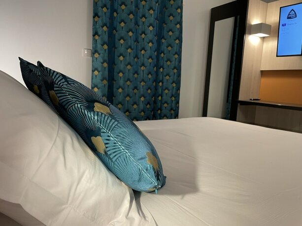 Imagen de la habitación del Hotel H&ocirc;tel Akena Molinges - La Brocatelle. Foto 17