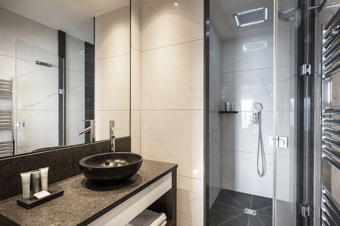 Imagen de la habitación del Hotel H&ocirc;tel Alpen Lodge. Foto 6