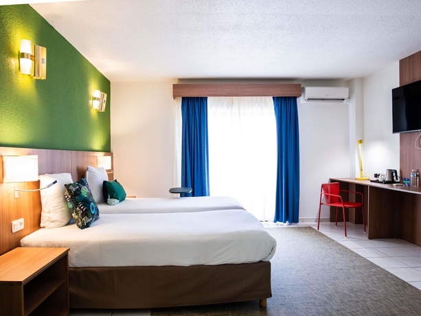 Imagen de la habitación del Hotel H&ocirc;tel Amazonia. Foto 14