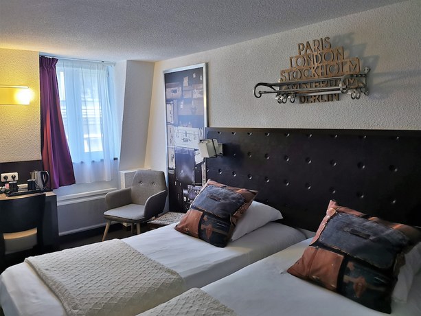 Imagen de la habitación del Hotel H&ocirc;tel Ambassadeur. Foto 12
