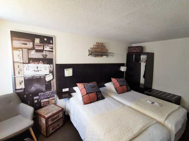 Imagen de la habitación del Hotel H&ocirc;tel Ambassadeur. Foto 13