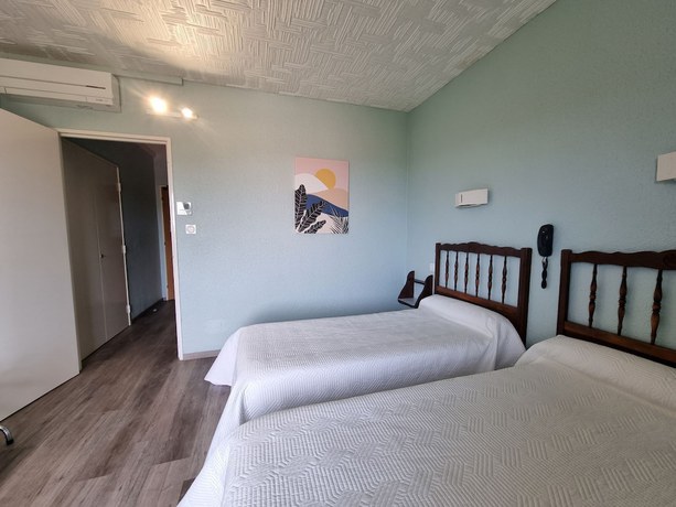 Imagen de la habitación del Hotel H&ocirc;tel Ambeille. Foto 2