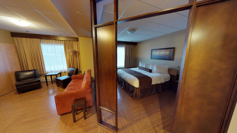 Imagen de la habitación del Hotel H&ocirc;tel And Suites Le Dauphin Drummondville. Foto 2