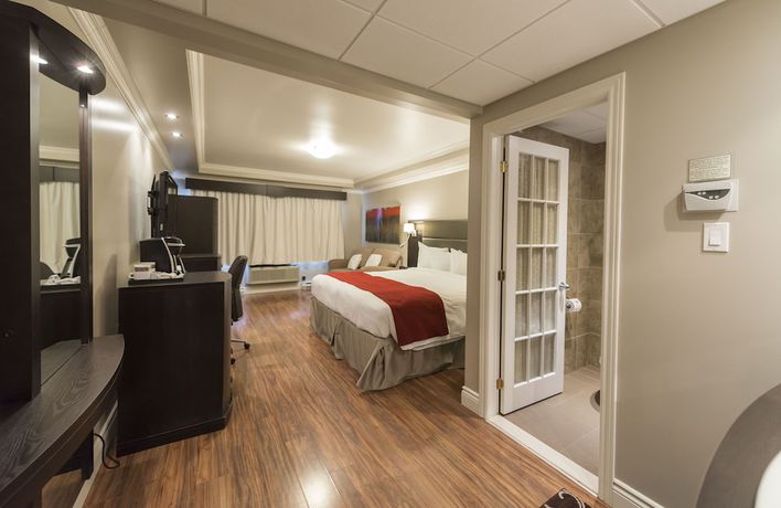 Imagen de la habitación del Hotel H&ocirc;tel And Suites Le Dauphin Drummondville. Foto 5