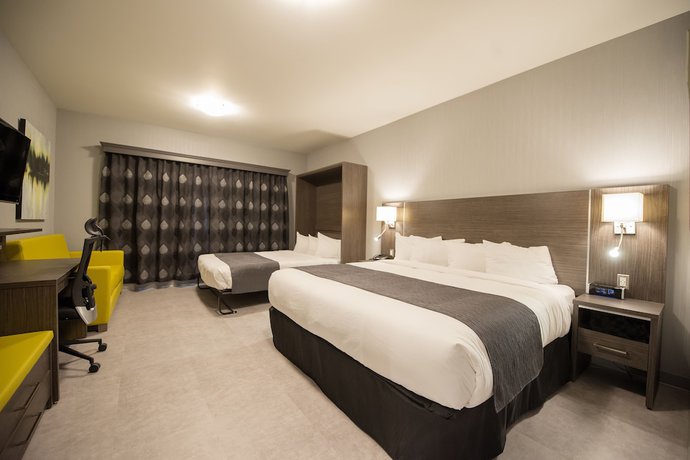 Imagen de la habitación del Hotel H&ocirc;tel And Suites Le Dauphin Drummondville. Foto 8