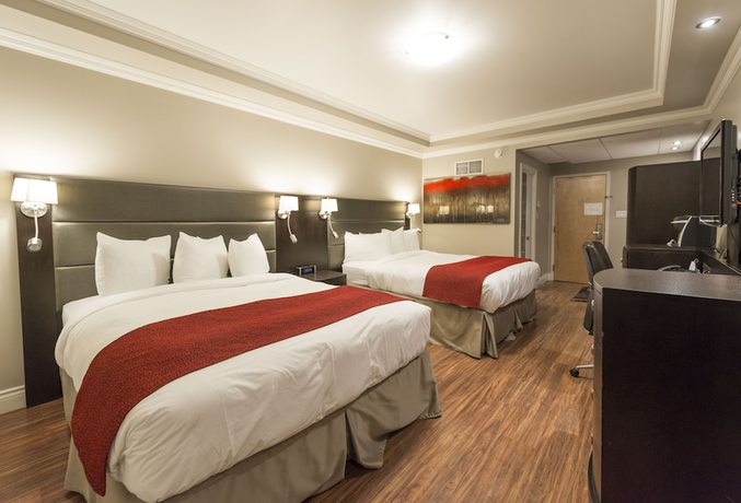 Imagen de la habitación del Hotel H&ocirc;tel And Suites Le Dauphin Drummondville. Foto 9