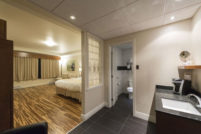 Imagen de la habitación del Hotel H&ocirc;tel And Suites Le Dauphin Drummondville. Foto 17