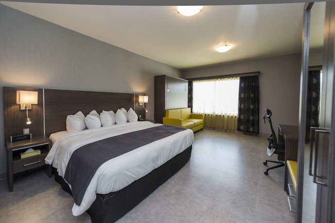Imagen de la habitación del Hotel H&ocirc;tel And Suites Le Dauphin Drummondville. Foto 18
