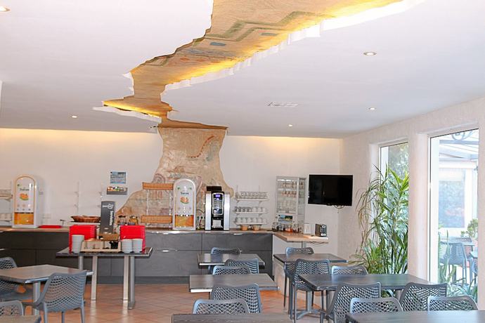 Imagen del bar/restaurante del Hotel Hôtel Aquarius. Foto 2