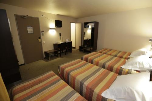 Imagen de la habitación del Hotel Hôtel Au Petit Caporal. Foto 7