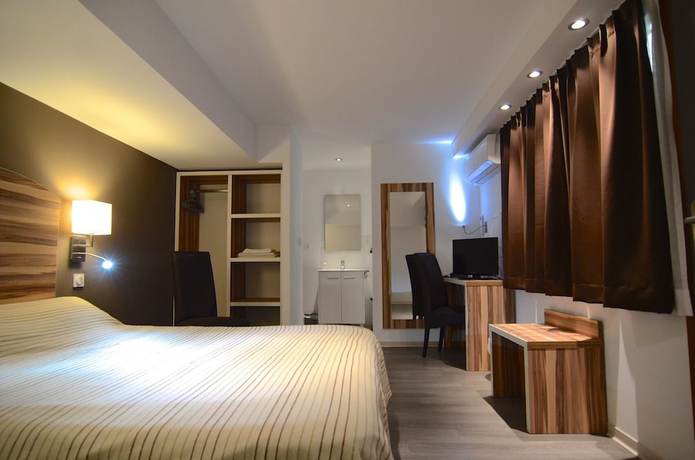 Imagen de la habitación del Hotel H&ocirc;tel Au Val&eacute;ry. Foto 17
