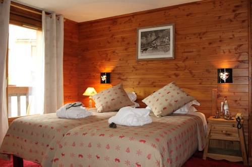 Imagen de la habitación del Hotel H&ocirc;tel Auberge Saint Hubert. Foto 11
