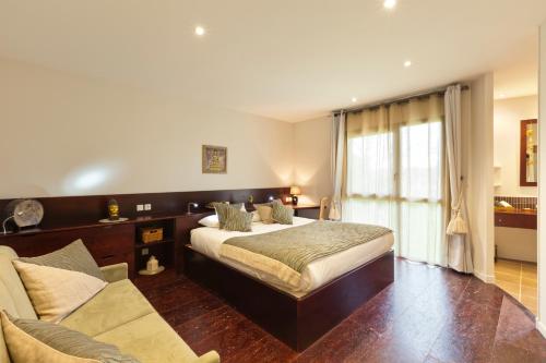 Imagen de la habitación del Hotel H&ocirc;tel Auberge de Chavannes. Foto 10