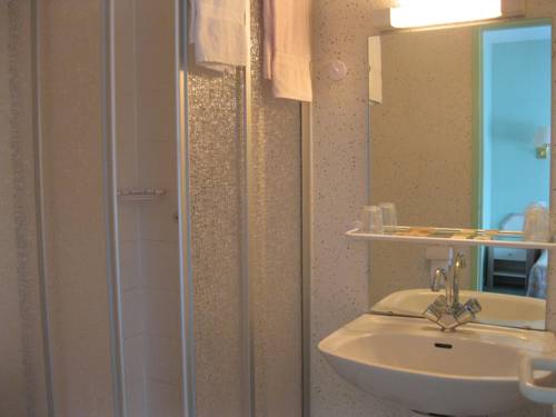 Imagen de la habitación del Hotel H&ocirc;tel Aux Cerisiers. Foto 14