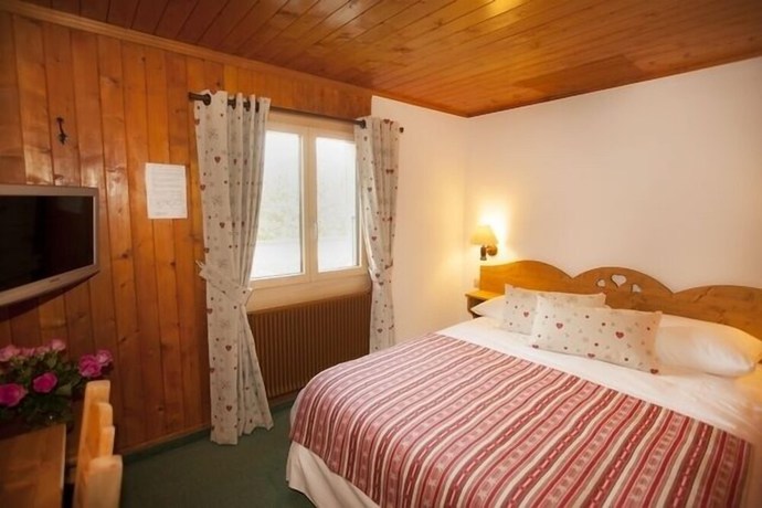 Imagen de la habitación del Hotel Hôtel Aux Mille Etoiles. Foto 4