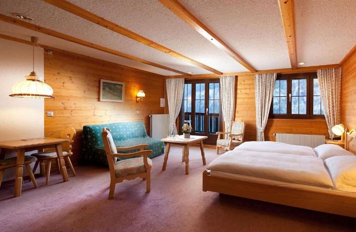 Imagen de la habitación del Hotel Hôtel Aux Mille Etoiles. Foto 8