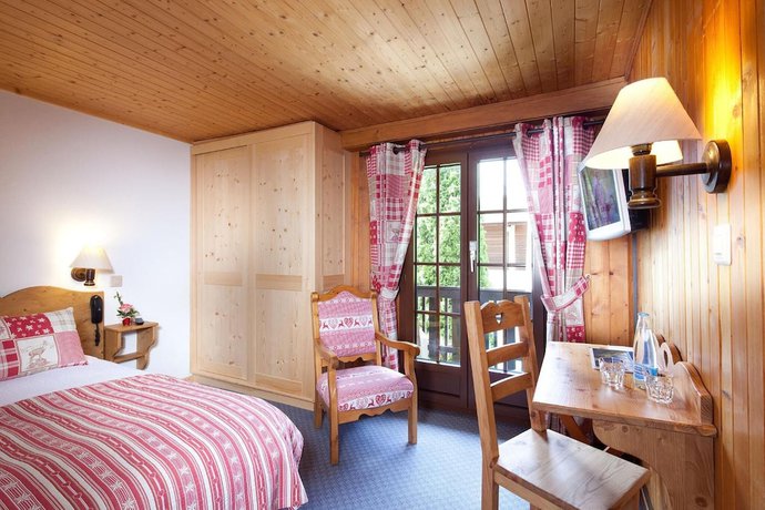 Imagen de la habitación del Hotel Hôtel Aux Mille Etoiles. Foto 9