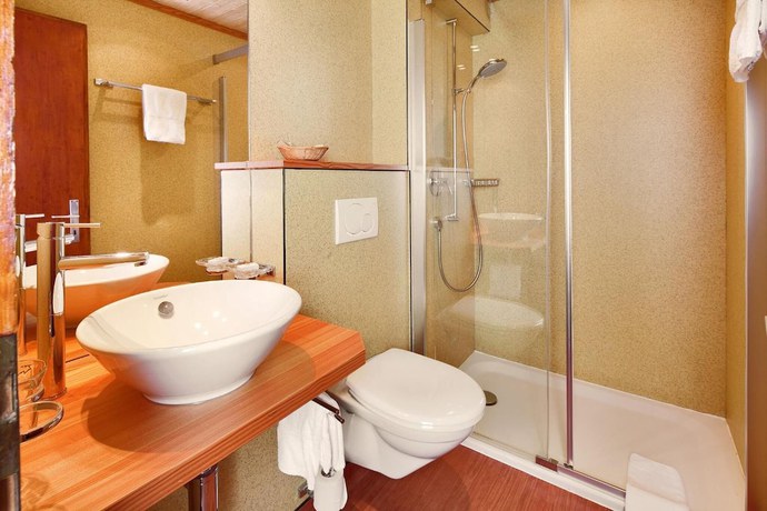 Imagen de la habitación del Hotel Hôtel Aux Mille Etoiles. Foto 10